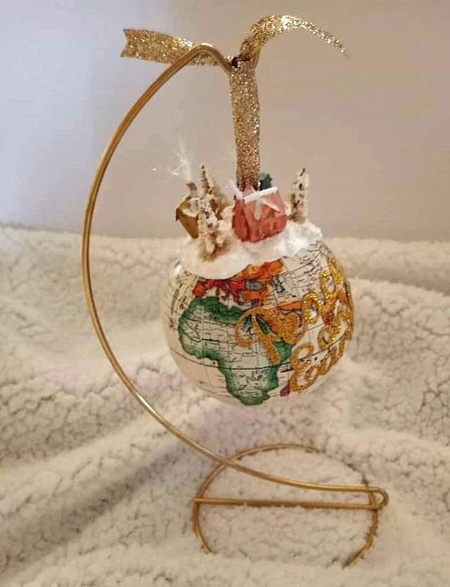 Tiny house on globe ornament