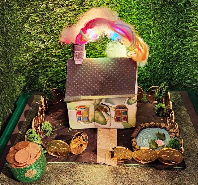 Miniature leprechaun house with rainbow