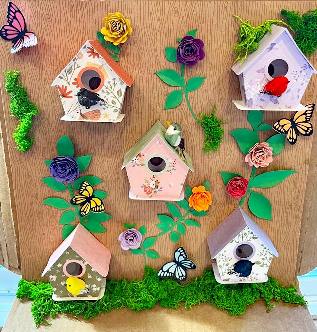 Wall of miniature bird houses