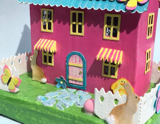 Front view of pastel Easter house closeup