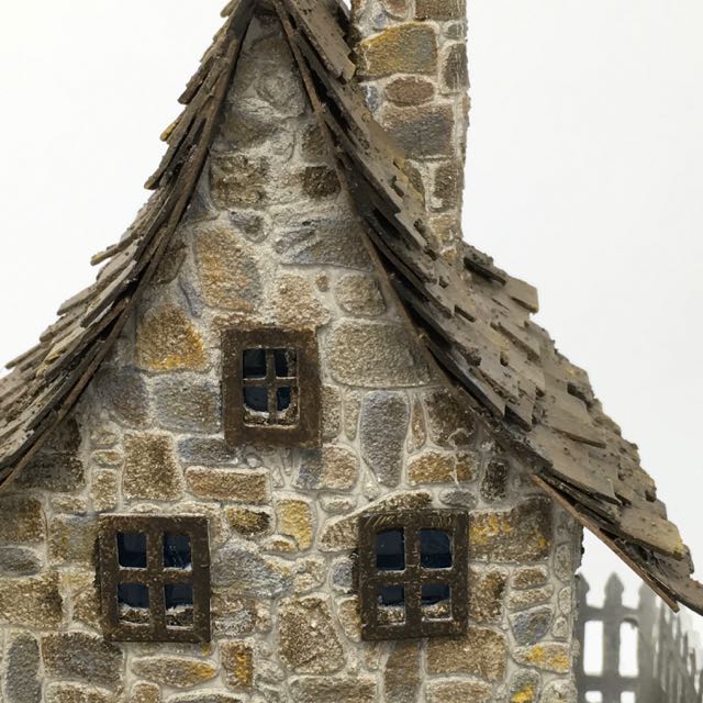 Close-up of stone texture on Irish cottage which mimics the look of real stone