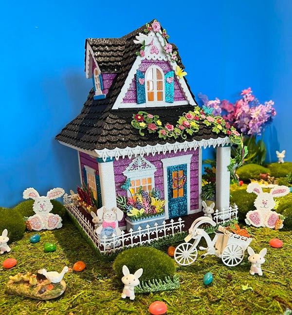 Purple Easter house with glitter and bunnies, flowers