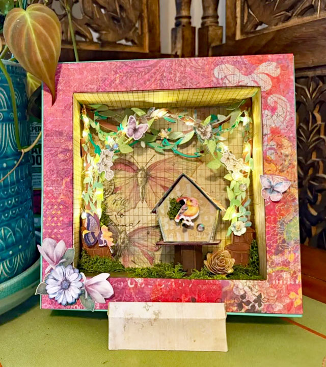 Bird house in a frame