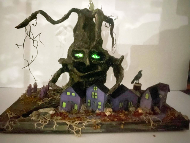 Paper Mache tree over a tiny halloween village
