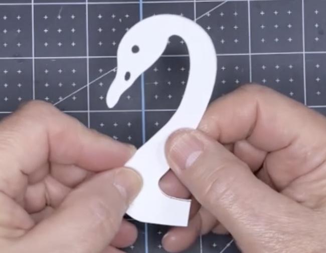 Adhere other side of swan with black cardstock in center