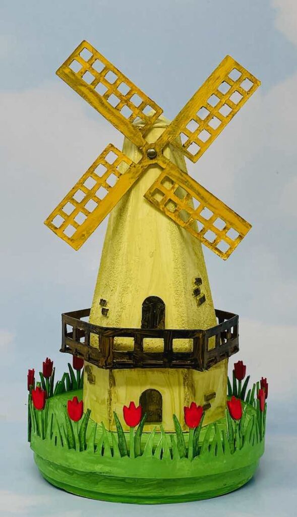 Antiqued painted yellow dutch windmill