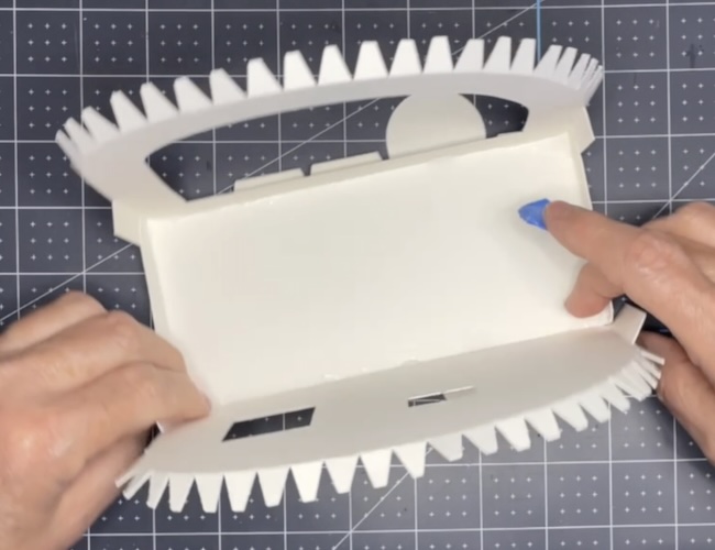 apply front piece to travel trailer base