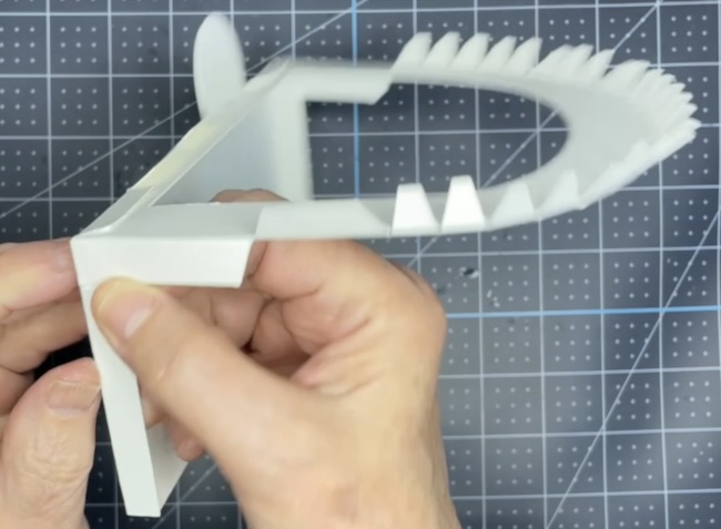 Apply glue or tape to tabs