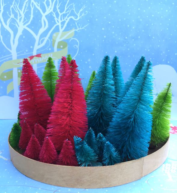 Bottle brush trees stained with distress spray stains#bottlebrushtree #christmasornaments #putzhouse