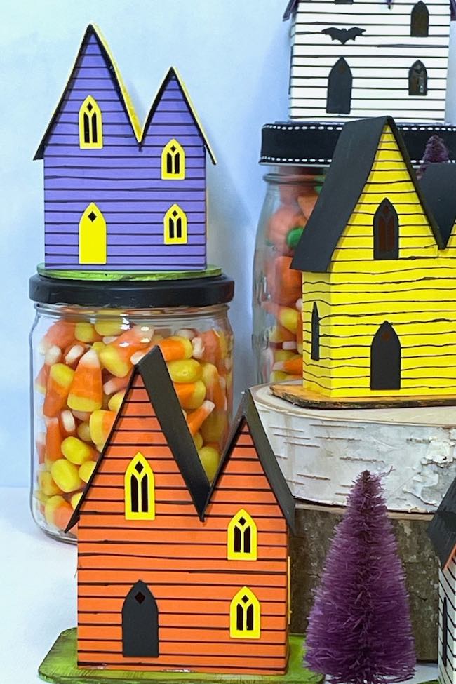 Candy corn jar with Halloween cottages