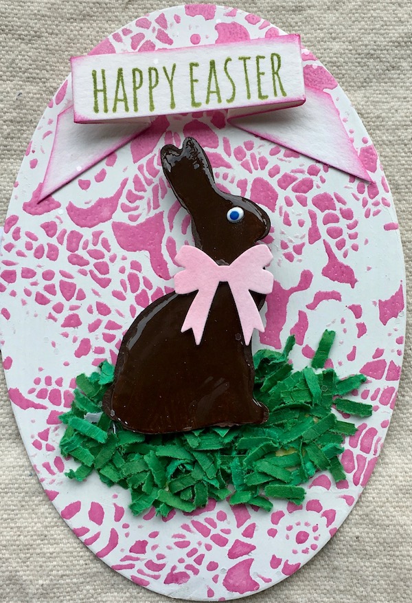 Inside of chocolate bunny card on embossed background