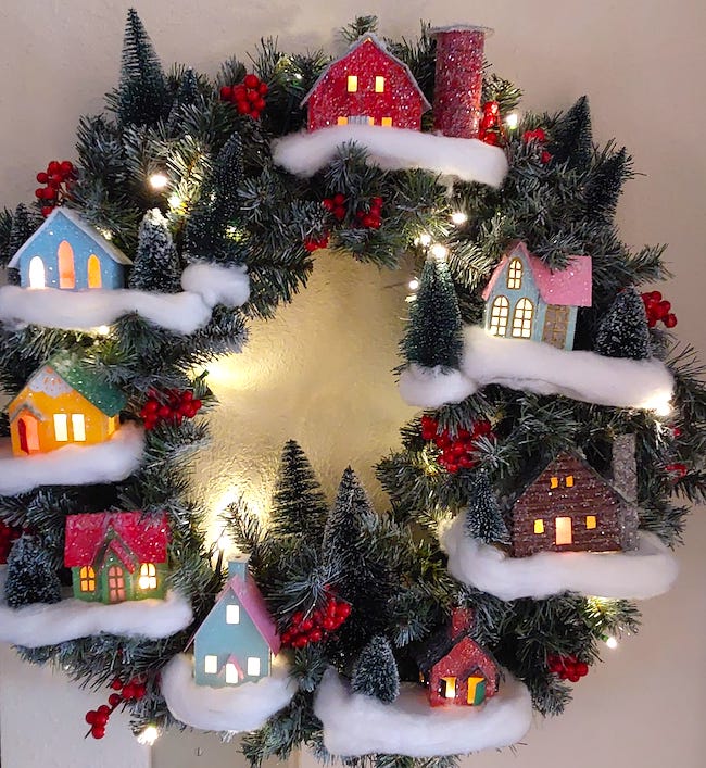 Christmas wreath with little cardboard houses
