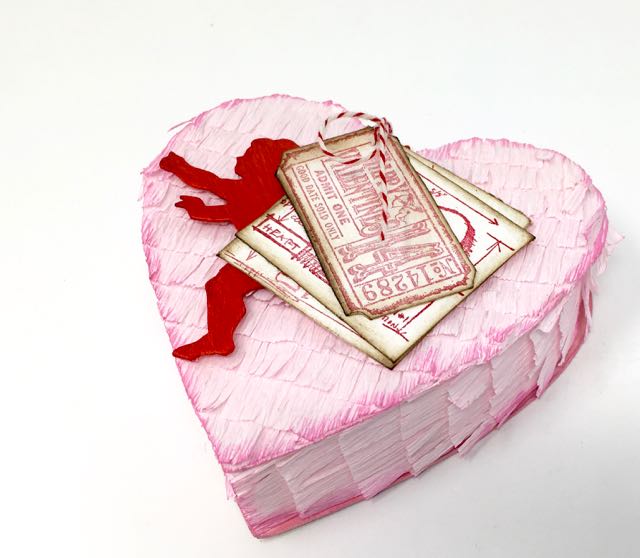 Heart-shaped Valentine Piñata candy box with Cupid and Valentine tickets