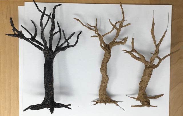 Completed twisted tree designed for Halloween decor with 2 in progress