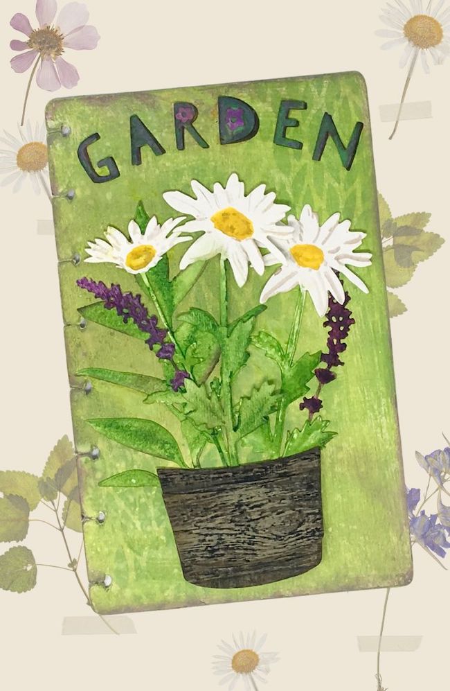 Daisy flowers on bucket for garden journal