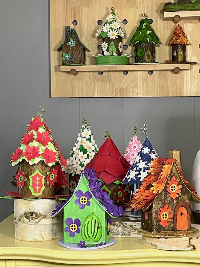 Colorful fairy houses on display