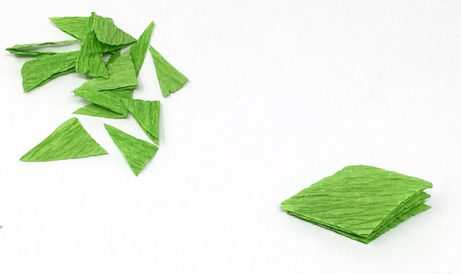 Crepe paper cut in diamond shape to make crepe paper leaves cherry blossom tree