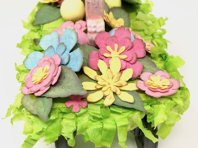 Paper flowers on Easter bunny decoration pull toy