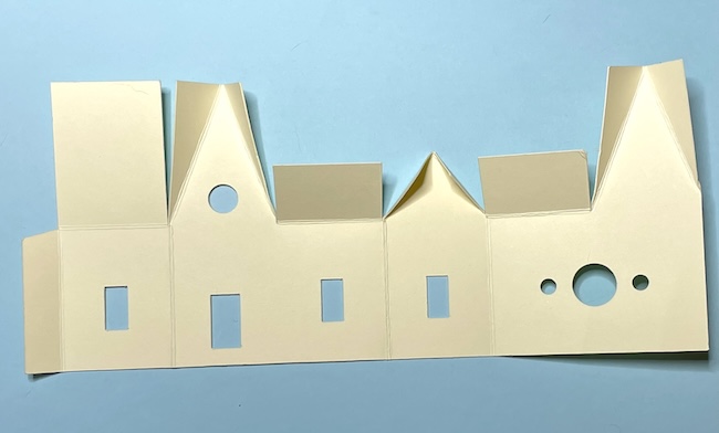 Fold along score lines