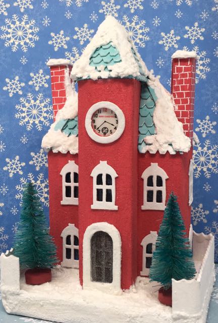 Kelly's Christmas Clockhouse Putz house front view with glitter and snowy details #putzhouse #paperhouse #papercraft