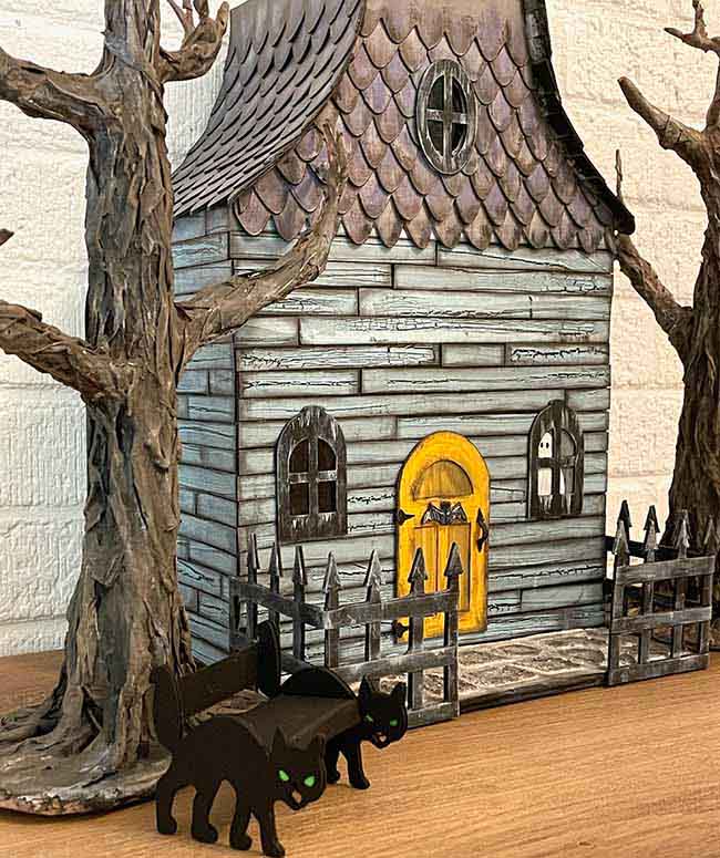 Front view dollhouse with spooky paper mache trees cat bench