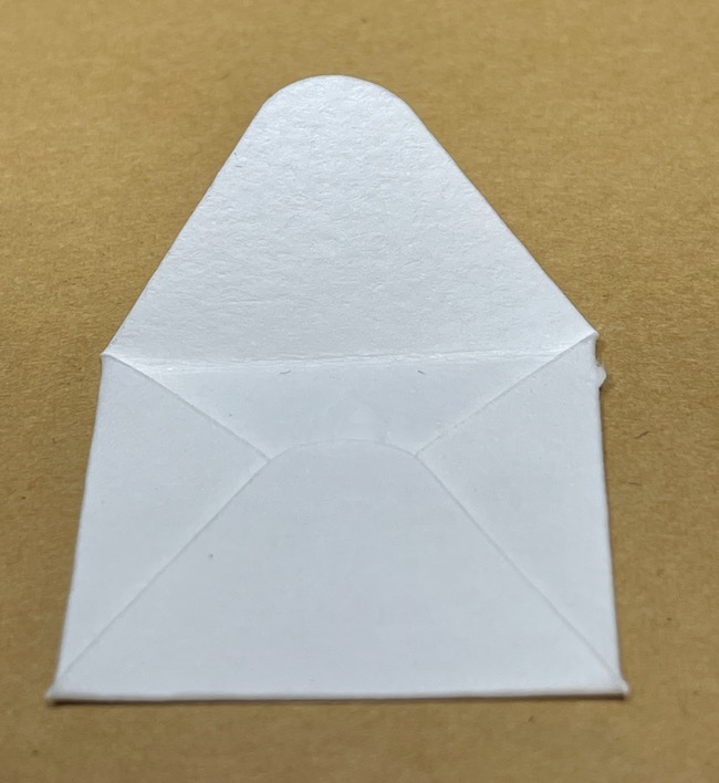 Glue down flaps on envelope