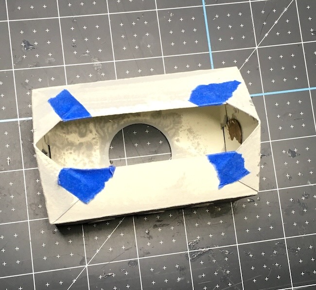 Glue roof tabs to roof flaps Norman Church