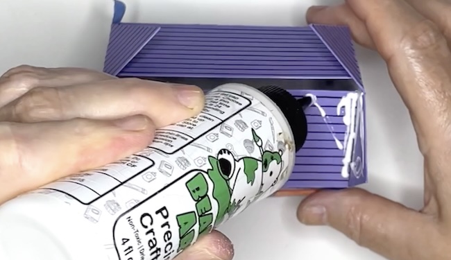 Glue roof tabs to the roof flaps Haunted House with porch