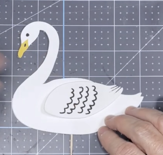 glue wings on each side of swan