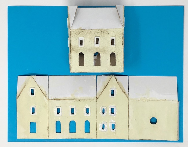 Glue windows and doors to miniature house
