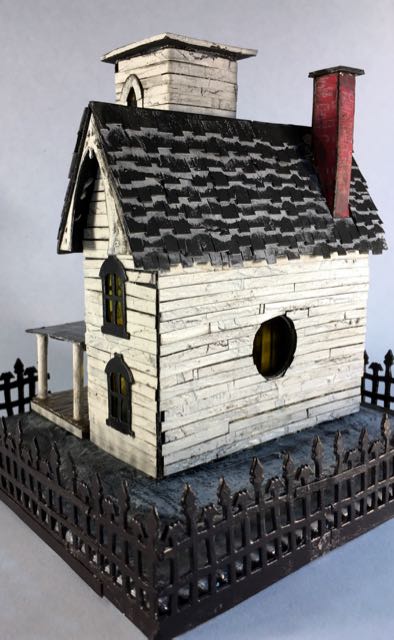 Italianate Halloween House back view with the light hole and the crackled siding #halloweenhouse #halloween #putzhouse #papercraft