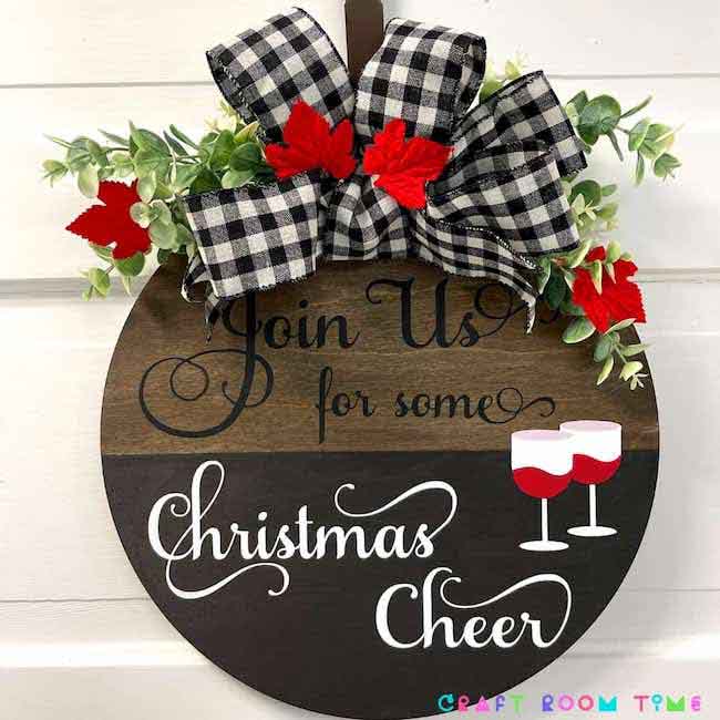 Wooden Christmas sign with gingham bow