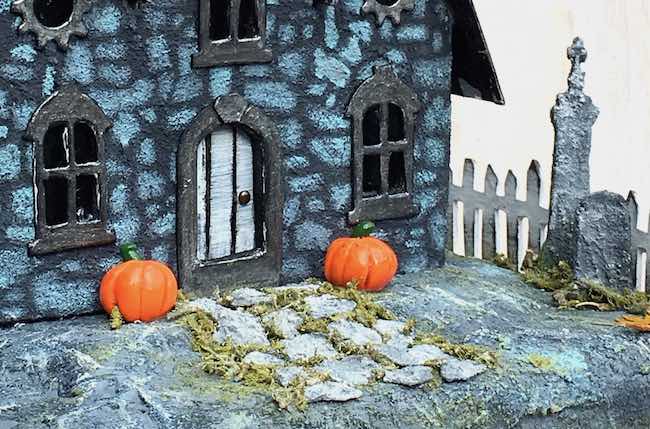 Landscaping stones on Jeremiah's Halloween paper house