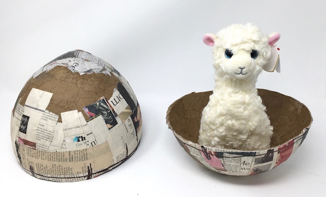 Large paper mache egg with llama test fit