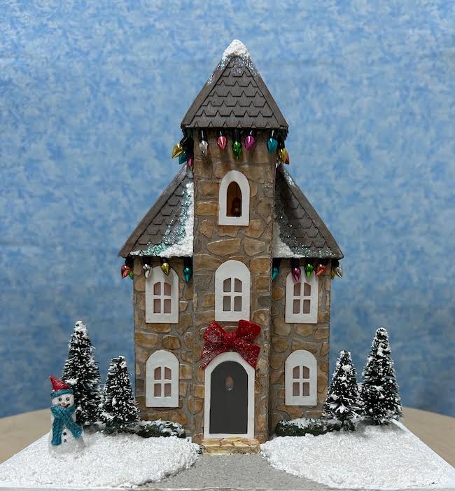 Stone covered cardboard Christmas mansion