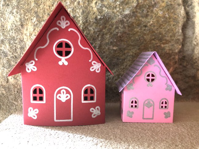 Maggie and Macy's paper houses with glitter pens