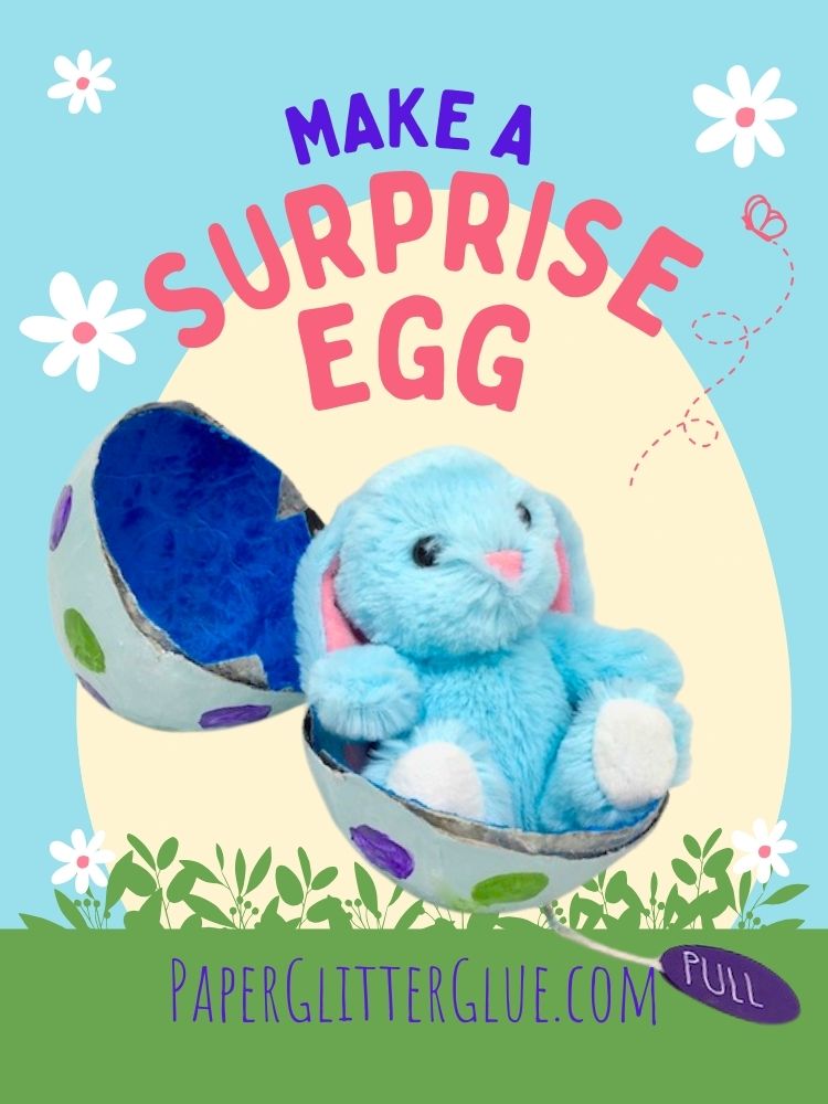 Paper Mache egg with blue stuffed bunny inside