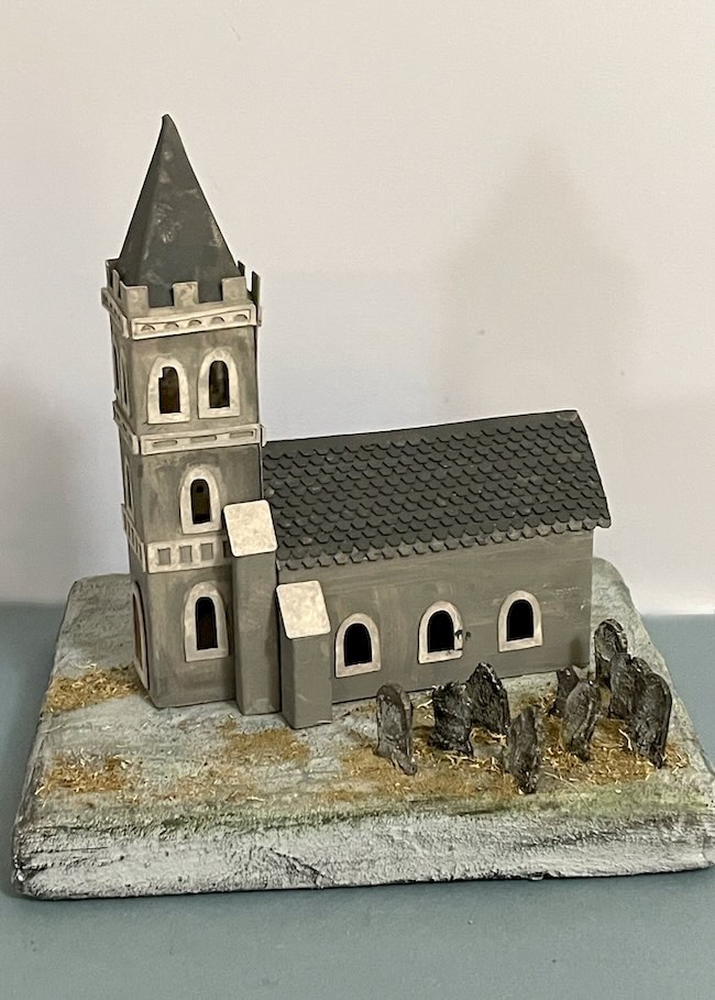 Norman Church with base old gravestones