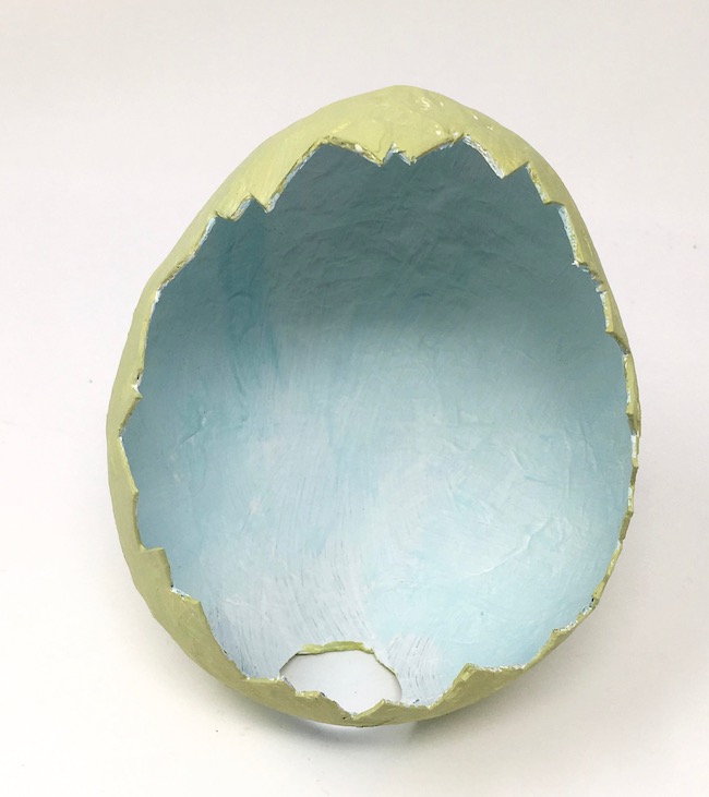 Painted paper mache egg for dinosaur diorama