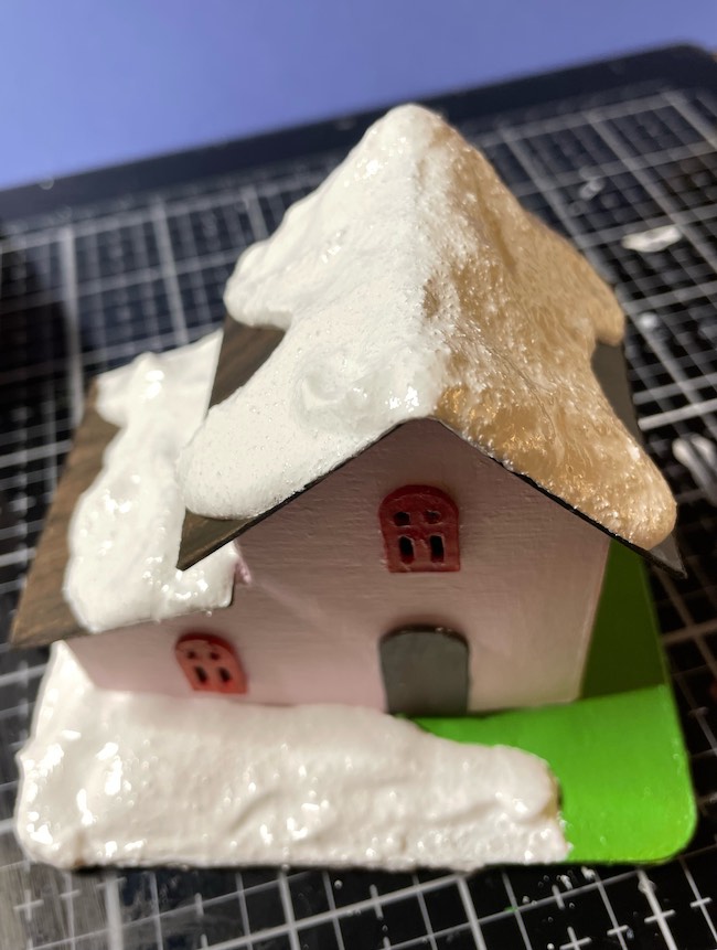 Snow-tex application to pink Christmas putz house