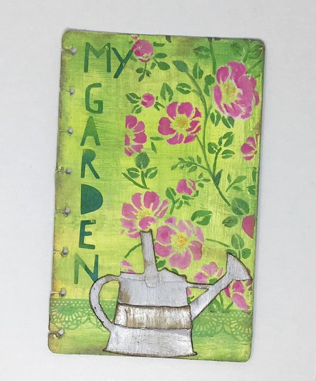Stenciled flower design for my garden notebook cover