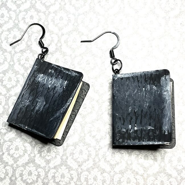 2 small black book earrings