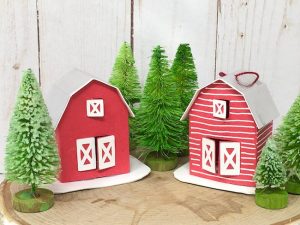 Two tiny barn paper ornaments