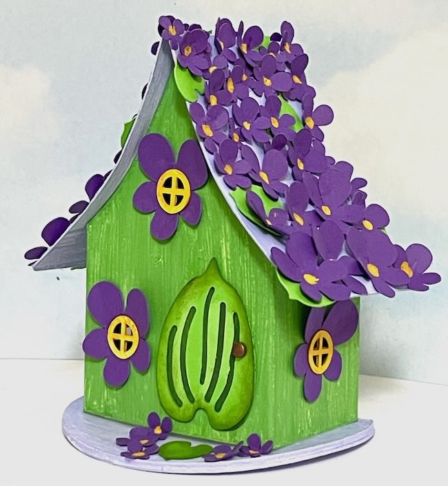 Violets on the roof bright green body