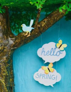 Paper mache tree with Hello Spring sign