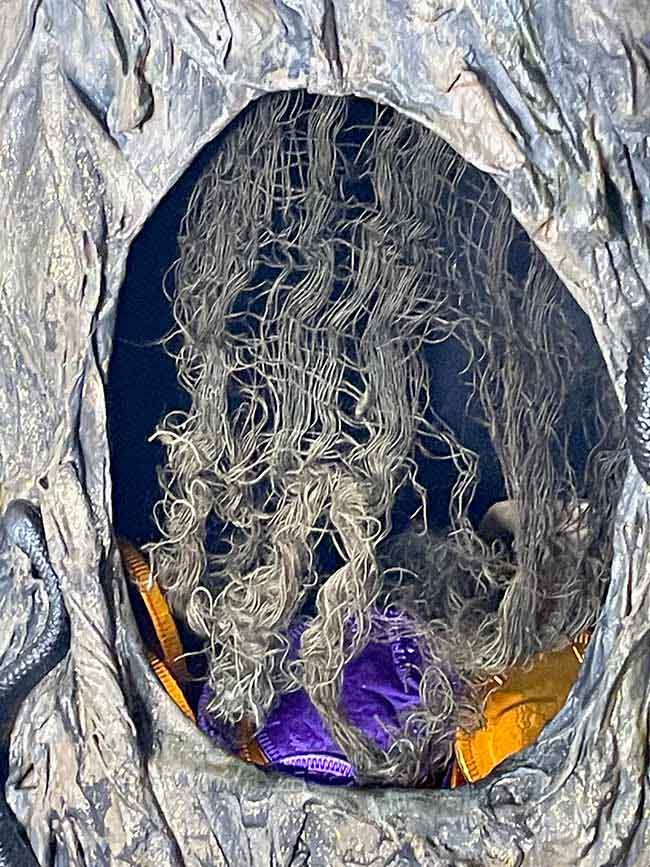 closeup view of the cheesecloth in the opening of the tree stump candy bowl