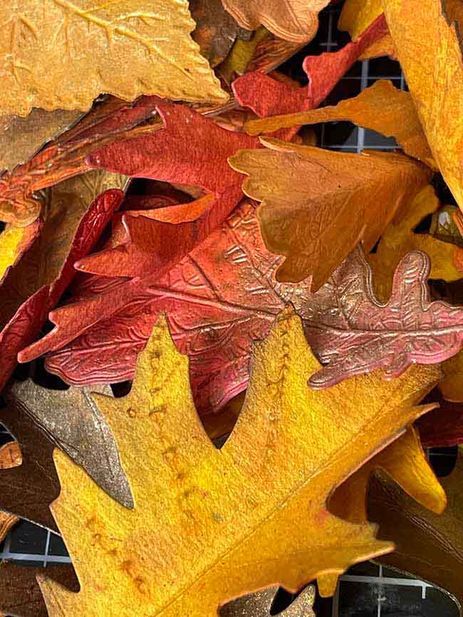 colorful fall paper leaves made with watercolor paper and spray stains