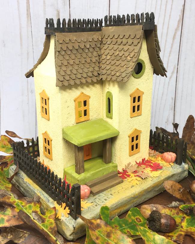 completed Thanksgiving Putz house with leaves