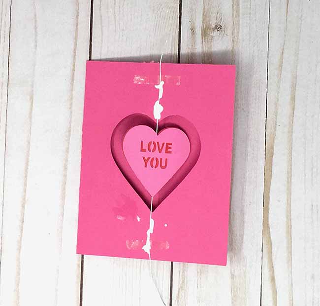 suspend heart on string for valentine spinner card