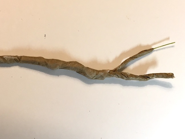 wrapped branch for spooky tree